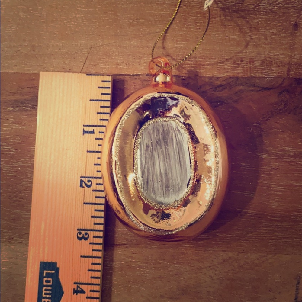 West Elm letter “O” ornament. Rose gold.